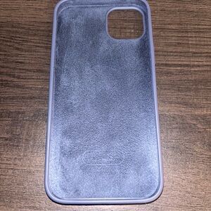 Blue rubber phone case, had a small rip at the front.